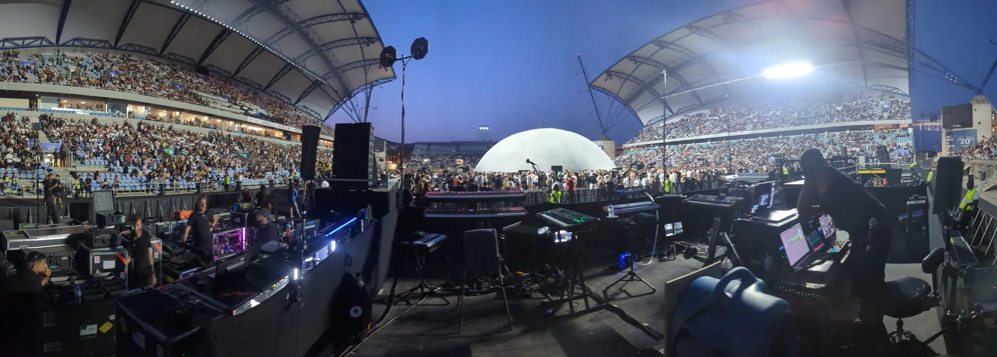 Panorama from side of stage at Estádio Algarve, keys world and band risers, dome stage and full stands